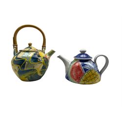 Richard Wilson (British Contemporary) glazed teapot with cane handle, impressed marks beneath H27cm together with another studio pottery teapot by Daphne Carnegy (2)