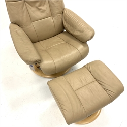  Ekornes Stressless leather upholstered reclining armchair with stool,   
