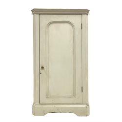 Early 20th century painted pine floor standing corner cupboard, the single panelled door enclosing shelves, raised on shaped skirted base 