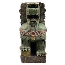 Large Chinese carved Lion Dog or Guardian Lion, the open mouthed lion with front foot resting on a ball, with polychrome decoration, H42cm x D26cm 