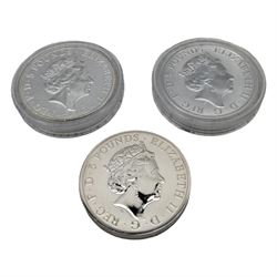 Three Queen Elizabeth II two ounce fine silver five pound coins, comprising 2017 'Griffin of Edward III', 2020 'White Horse of Hanover' and 2020 'White Lion of Mortimer'