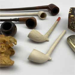 Three clay pipes, a pipe bowl in the form of the Duchess of Devonshire by C Crop, London, long stem 'Society' pipe and various others