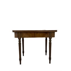 Mahogany tilt top table, the fold over top raised on turned and reeded supports 