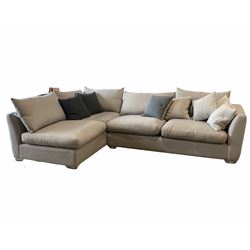 Large contemporary corner sofa, with squab cushions, upholstered in grey fabric, raised on chrome bracket supports 300cm x 195cm