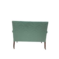 Edwardian mahogany two seat settee, the show frame with boxwood and satinwood inlay, upholstered in blue floral damask silk fabric, raised on square tapered supports with brass and ceramic castors W125cm