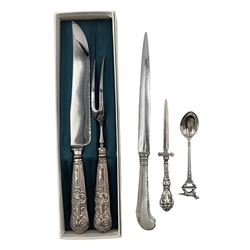Silver pistol handled paper knife L27cm London 1971, small silver handled paper knife with embossed decoration L15cm, Viners silver handled carving knife and fork, boxed and a teaspoon with dog finial 