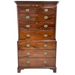 George III mahogany chest on chest, projecting cornice over figured frieze with shell and bird motif oval inlays, the top section with feather banded canted corners, fitted with two short and six long drawers, lower moulding over bracket feet