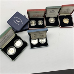 Seven United Kingdom silver proof coins/sets including two 1986 two pound coins, 1990 five pence two-coin set, 1992 ten pence two-coin set, 1997 fifty pence two-coin set etc, all cased with certificates