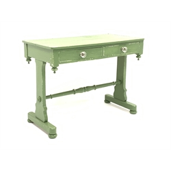 Victorian green painted pine side table fitted with two drawers with moulded glass handles, on shaped end supports connected by turned stretcher, W100cm, H74cm, D51cm