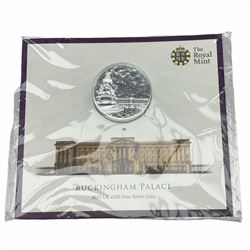 The Royal Mint Buckingham Palace UK 2015 one-hundred pounds fine silver coin, on card