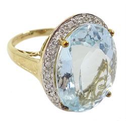 9ct gold large oval blue topaz and diamond cluster ring, hallmarked