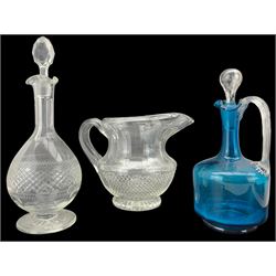 19th century Anglo-Irish cut glass water jug, with mitre cut inverted rim, slice cut neck, with diamond cut below H17cm, together with a Victorian blue glass claret jug and Edwardian decanter (3)