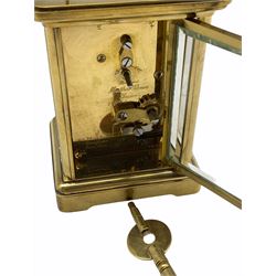 20th Century Mathew Norman eight-day Corniche cased timepiece carriage clock with a lever platform escapement, eleven Jewels, timing screws, Swiss Movement, white enamel dial with Roman numerals, minute markers and steel moon hands, bevelled glass panels to case and a rectangular glass panel to the top of the case, with key.
