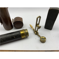 Small four drawer brass telescope with outer leather case, 35cm extended length, small late 19th century brass magnifying glass with ivory handle, possibly for map reading, boxwood ruler and a travelling inkwell 