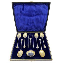 Set of six silver coffee spoons with gilded shell shape bowls, spiral stems and crown finials with matching tongs and sifting spoon, cased Birmingham 1896 Maker William Devenport