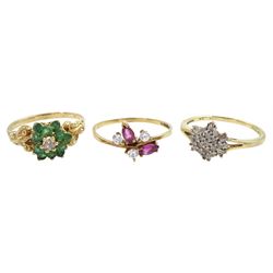 Gold baguette and round diamond dress ring, emerald and diamond cluster ring and a gold cubic zirconia ring, all 9ct