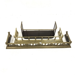 Edwardian brass fire curb with floral and spiral supports on moulded base, (L131cm) and two other fire curbs, (L103cm) 