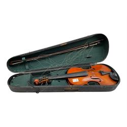 Vintage violin with bow in carrying case