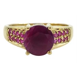 9ct gold round ruby ring, with ruby set shoulders, hallmarked