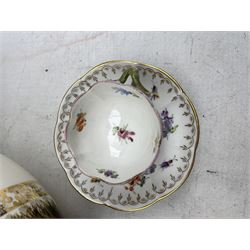 Dresden floral encrusted tea cup and saucer, hand painted with floral sprigs and insects, together with a Dresden hand painted chamber pot (2)