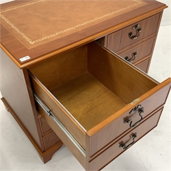 Cherry wood four drawer filing cabinet with inset leather top, on bracket feet, W93cm, H78cm, D61cm