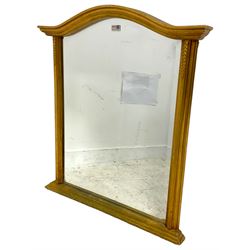 Gilt framed mirror, arched cresting over moulded uprights, bevelled plate
