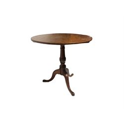 Late 18th century oak tripod table, circular tilt-top on turned pedestal, three splayed supports