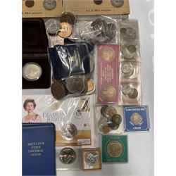 Queen Elizabeth II commemorative crowns including Great British and Isle of Man examples, The Royal Mint 'Diamond Jubilee 1952-2012' coin cover containing a 2012 five pound coin, King George VI 1944 sixpence, one shilling, two shillings and half crown coins, commemorative medallions, empty coin boxes etc and various books relating to coin collecting 