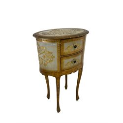 Cream and gilt lamp or bedside table, oval form and fitted with two drawers, decorated with scrolling foliate patterns (W53cm, H81cm, D38cm), together with a similar kidney shaped lamp table (W53cm, H68cm, D32cm), and side cabinet (W64cm, H69cm, D33cm)
