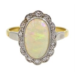 Gold oval opal and diamond, milgrain set cluster ring, makers mark B.K.T, stamped 18ct & Plat