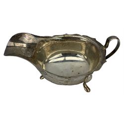 Silver sauce boat with crimped rim and triple supports Sheffield 1959 Maker Viners Ltd  