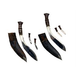 Nepalese  Kukhri and scabbard with two skinning knives and another similar (2)