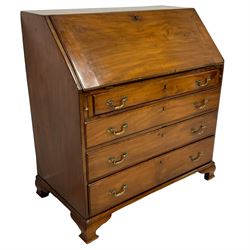 George III mahogany bureau, the fall front enclosing interior fitted with drawers, cupboard and document divisions, fitted with four graduating drawers, on ogee bracket feet