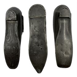Three 19th century pewter snuff boxes in the form of shoes, two having engine turned decoration and the other with punches stitching details, L8.5cm max