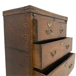 18th century oak bachelor's chest, the fold-over top with stays and inset baize lining to interior, fitted with two short over two long drawers with brass escutcheons and drop handles, lower moulded edge over bracket feet