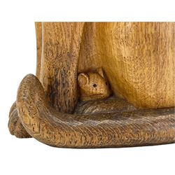 Mouseman - carved oak figure of a seated Siamese cat, with light blue coloured eyes, carved with mouse signature between legs, by the workshop of Robert Thompson, Kilburn 