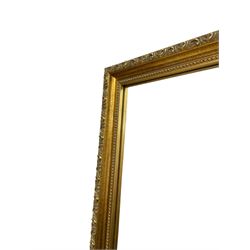 Large gilt framed rectangular mirror, the frame decorated with stylised foliate band and beaded inner slip, plain mirror plate 
Provenance: From the Estate of the late Dowager Lady St Oswald