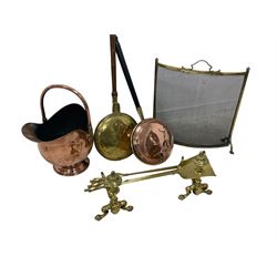 Collection of metal ware - 19th century copper fire bucket; two bed warming pans; spark screen; fireside tools and tool rests (9) 