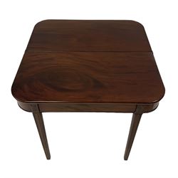 Mahogany fold over tea table, raised on reeded and squared supports 