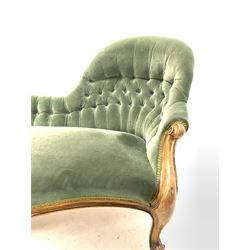 Victorian walnut framed serpentine chaise longue, upholstered in buttoned green velvet, with scrolled arm terminals and supports terminating in brass castors, L180cm