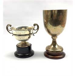 Silver pedestal trophy 'Wortley Golf Club' with inscription H20cm Sheffield 1946 and a two handled golfing trophy 17.7oz