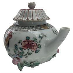 Chinese famille rose teapot, Qianlong period, of compressed spherical form with lotus moulded cover and naturalistic flowering branch work base, the body enamelled with two black cockerels amongst rockwork and flowering branches within grey cell pattern borders, H12cm. Provenance: From the Estate of the late Dowager Lady St Oswald