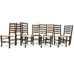 Harlequin set of eight 19th century oak ladder back chairs, with rush seats and turned supports, W49cm