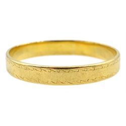 22ct gold wedding band, with engraved decoration
