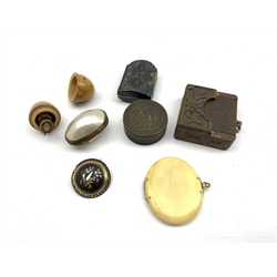 Small collectible items including coquille nut cotton reel holder, Swiss fob watch with silver case in a Swiss carved wooden holder, late 19th/early 20th century oval folding ivory photograph frame, metal rouge pot, miniature folding Icon and two other items