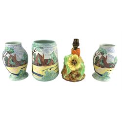 Three Art Deco Delcroft Ware pottery vases, painted and tube lined with landscape scenes, shape numbers 637 & 642, H19cm, together with a Flosmaron pottery lamp vase (4)