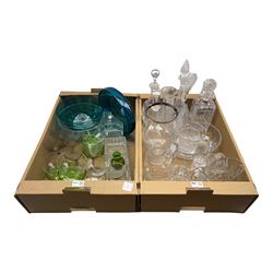 Two blue glass bowls, glass sundae dishes, decanters, vases, heavy cut glass jug and other glassware in two boxes