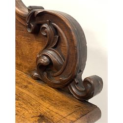 Victorian oak console table, the raised back with applied floral moulding over rectangular top with canted corners and panelled frieze with shaped apron, raised on shaped supports with paw feet W140cm, H108cm, D44cm