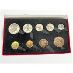 King George VI 1950 nine coin set, from three pence to half crown, housed in The Royal Mint red card case