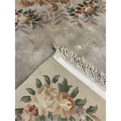 Chinese washed wool beige rug with all over foliate and floral design 272cm x 390cm